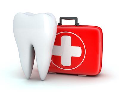 Tooth next to a first aid kit, lindenhurst ny
