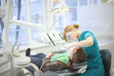 Boy receiving dental treatment, Lindenhurst NY