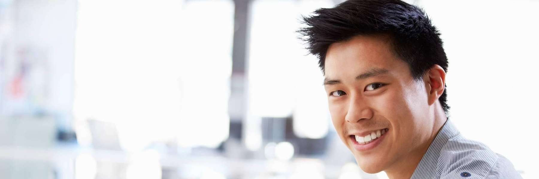 Asian man smiling before composite bonding, lindenhurst ny