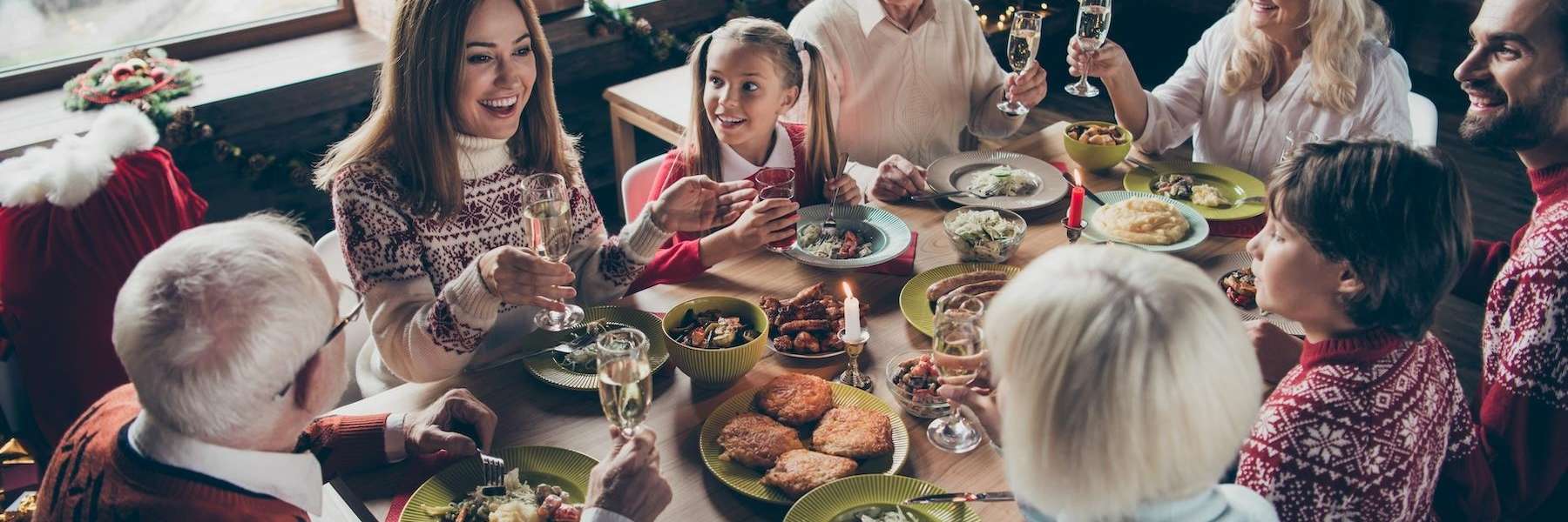 People are a table with food smiling, lindenhurst ny